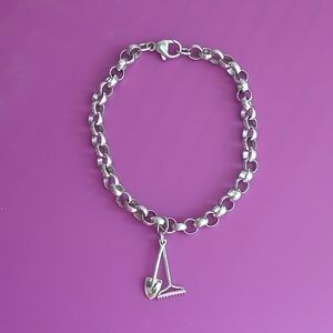 Sterling Silver Bracelet with Rake and Shovel Charms. Gardening themed charms